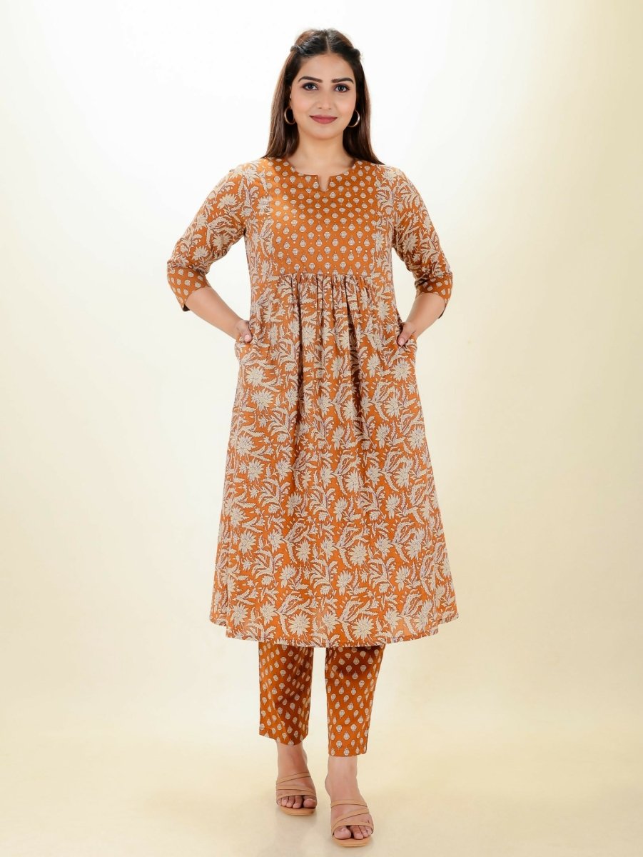 Aramya Orange Soft Cotton Floral Print Panelled Kurta Set for Women | Grocsy