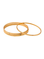 NVR Women's Set of 4 Gold-Polished Traditional Daily Use Bangles | Grocsy