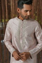 Sandstone Kanjivaram Machien Embroidered Pattu Set by Hilo Design | Grocsy