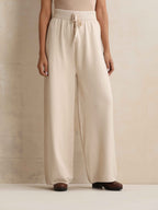 trueBrowns Ivory Woollen Flared Pants | Grocsy