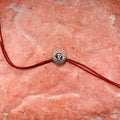 trueBrowns Sterling Silver Om Thread Rakhi | Grocsy