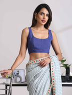trueBrowns Blue Muslin Solid Sleeveless Blouse | Grocsy