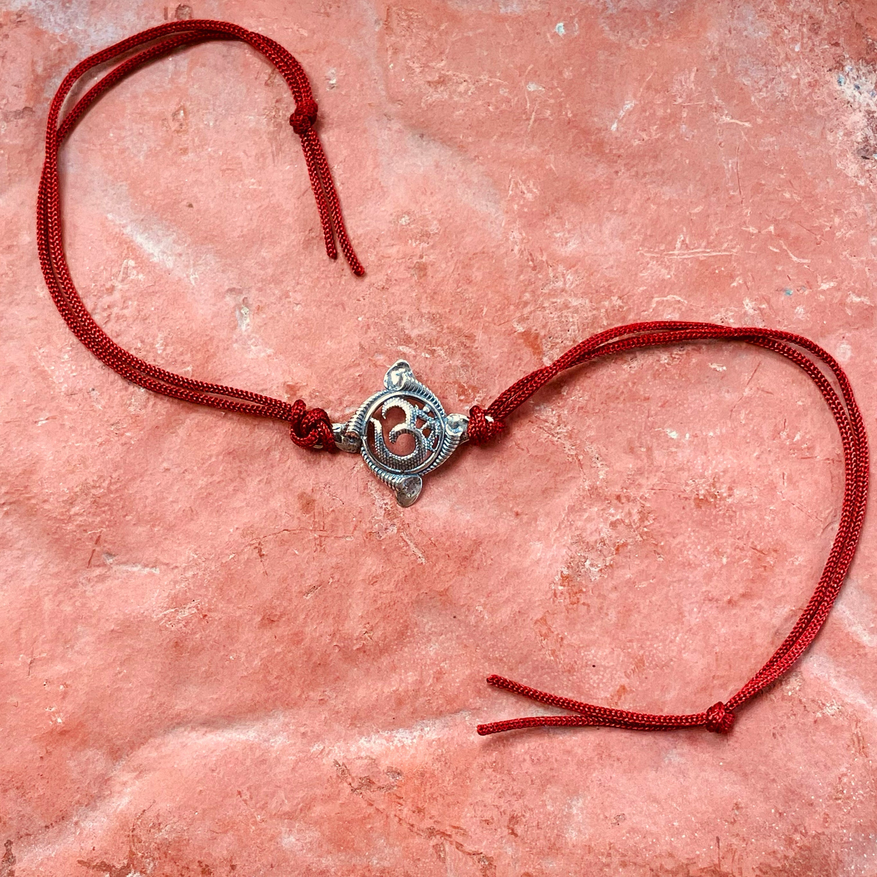 trueBrowns 925 Sterling Silver Textured Om Thread Rakhi | Grocsy