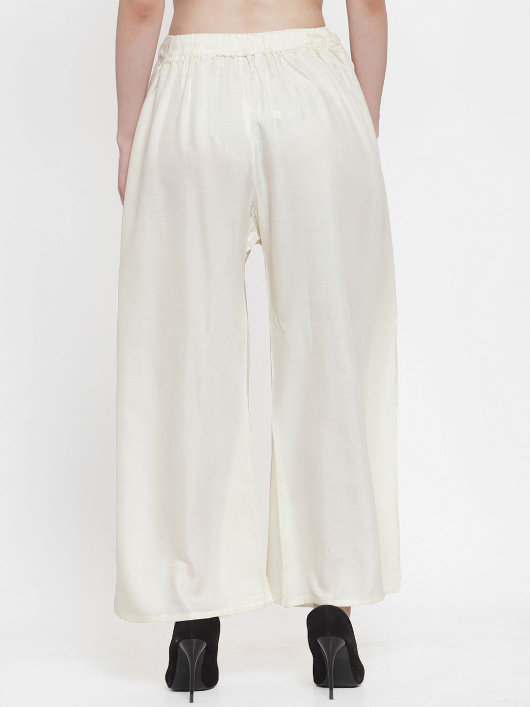 TAG 7 Women Off-White Solid Flared Palazzos | Grocsy
