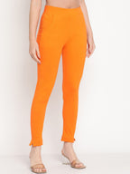 TAG 7 Women Orange Solid Leggings | Grocsy