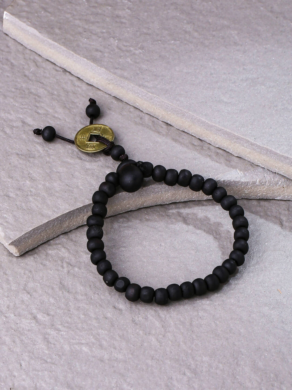NVR Men's Black Beaded Adjustable Bracelet | Grocsy