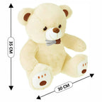 Webby Plush Cute Sitting Teddy Bear Soft Toys with Neck Bow and Foot Print (Beige) | Grocsy