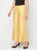 Aniyah Rayon Flared Slip-On Golden-Beige Palazzo | Grocsy