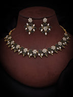 Tehzeeb Creations Black & White Gold Pleated Stone Studded Necklace With Earrings | Grocsy