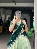 Lorenvalley Pista Zari Kota Zari Weaving Work With Sequins and Thread Embroidery Scallop Lace Border Lehenga Choli with Dupatta | Grocsy