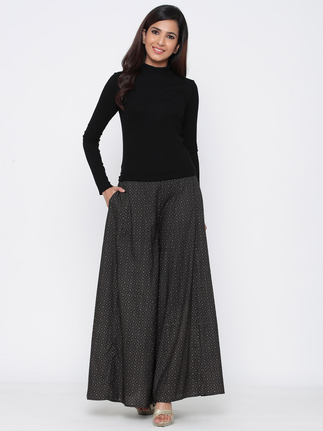 Juniper Women Black Rayon Printed Flared Palazzo | Grocsy
