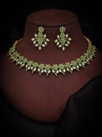 Tehzeeb Creations Sea Green Colour Gold Pleated Stone Studded Necklace With Earrings | Grocsy
