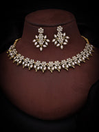Tehzeeb Creations White Colour Gold Pleated Stone Studded Necklace With Earrings | Grocsy