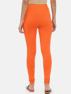 Souchii Orange Solid Slim-Fit Churidar-Length Leggings | Grocsy