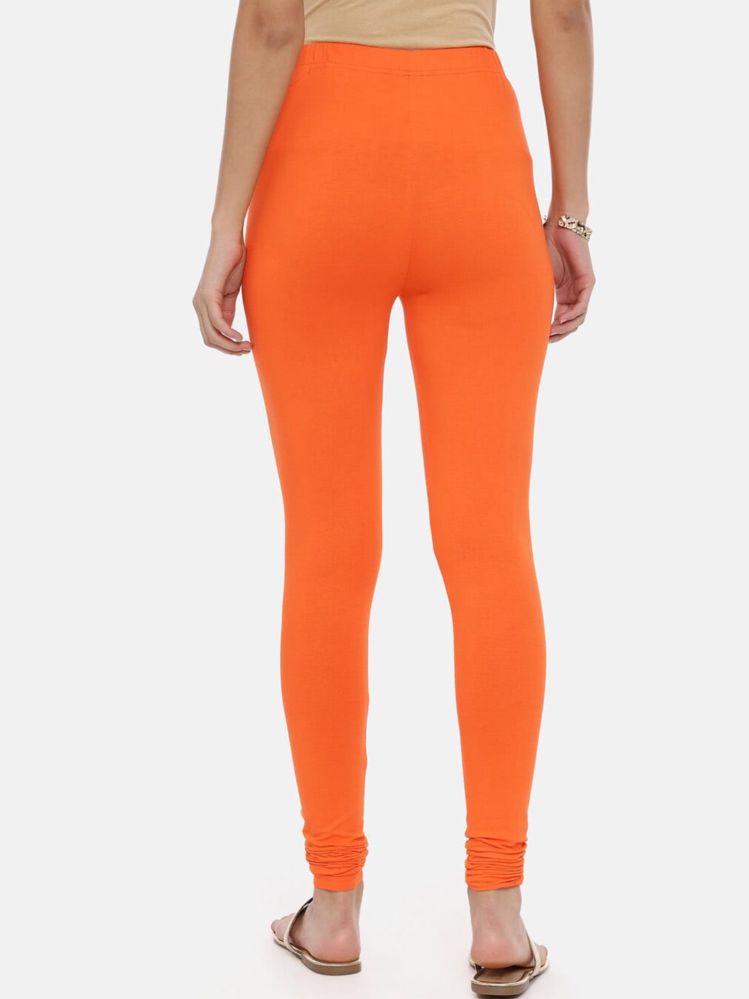 Souchii Orange Solid Slim-Fit Churidar-Length Leggings | Grocsy