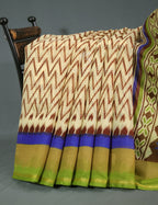 Shades of Cream And Parrot Green Blouse Patola Print Semi Chanderi Saree By Gayathri Reddy Designer Studio | Grocsy