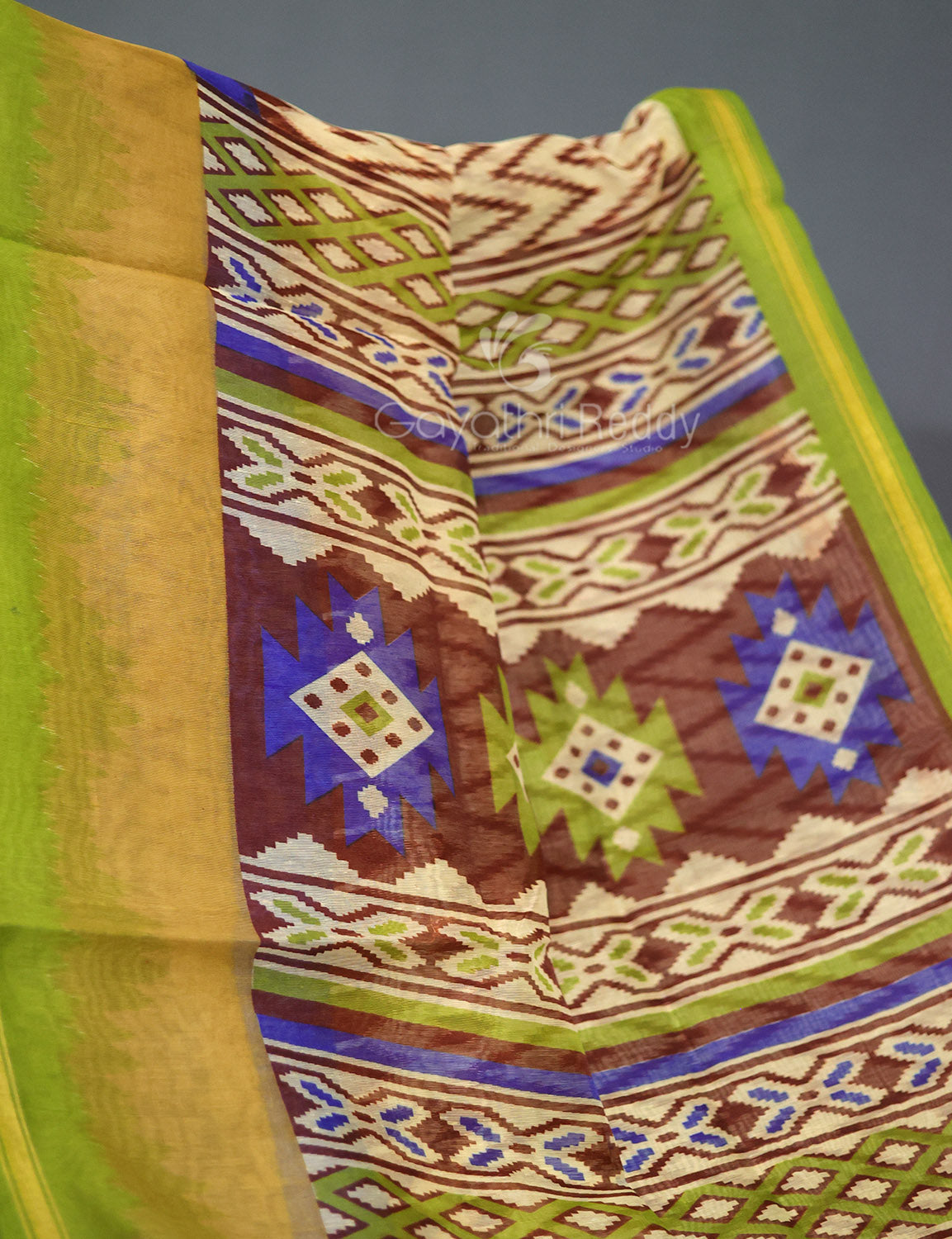Shades of Cream And Parrot Green Blouse Patola Print Semi Chanderi Saree By Gayathri Reddy Designer Studio | Grocsy