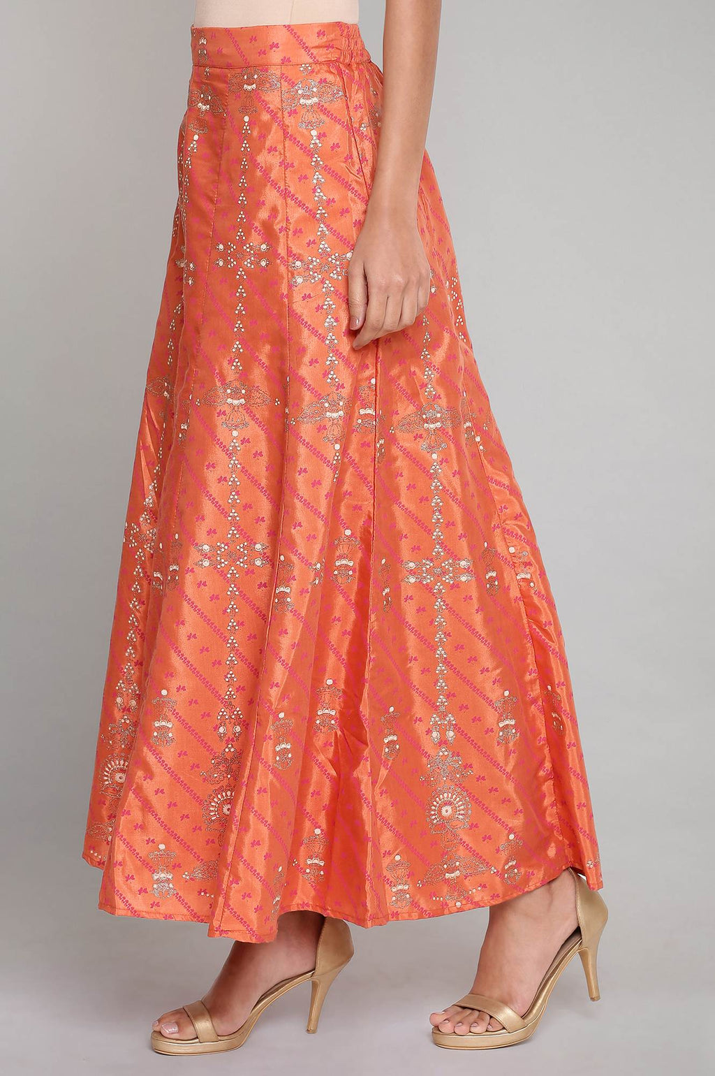 W for Woman Orange Printed Flared Pants | Grocsy