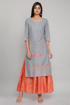 W for Woman Orange Printed Flared Pants | Grocsy