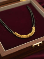 NVR Women Gold Plated Black Beaded Mangalsutra | Grocsy