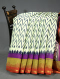 Shades of Cream And Red Blouse Patola Print Semi Chanderi Saree By Gayathri Reddy Designer Studio | Grocsy