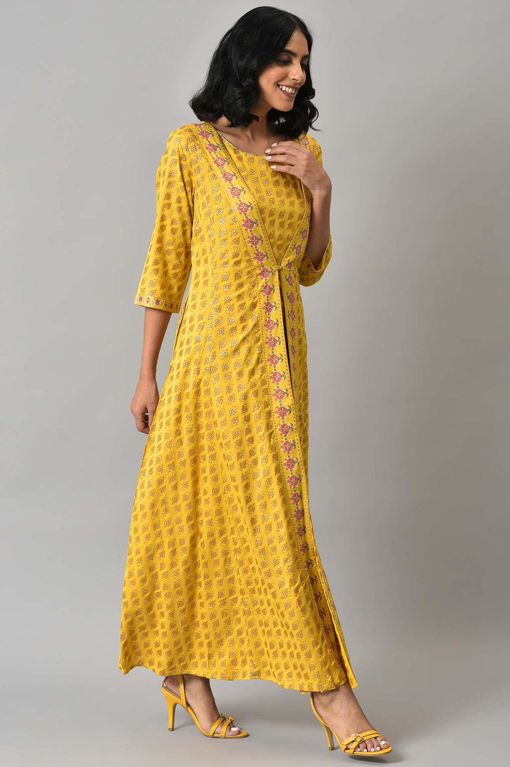 W for Woman Yellow Glitter Printed Mock Layered Embellished Jumpsuit | Grocsy