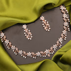 Tehzeeb Creations Rose Gold Pleated White Diamond With Gray Beads Necklace Set | Grocsy