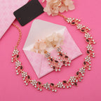 Tehzeeb Creations Rose Gold Pleated White Diamond With Maroon Beads Necklace Set | Grocsy