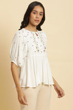 W for Woman White Peplum Cotton Top with Embroidered Yoke | Grocsy