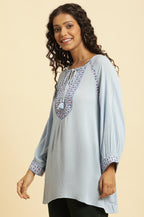 W for Woman Powder Blue Embroidered Yoke Rayon Crepe Straight Top | Grocsy