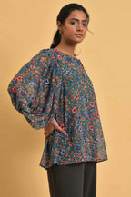W for Woman Green Floral Printed Georgette Top with Puffy Sleeves | Grocsy