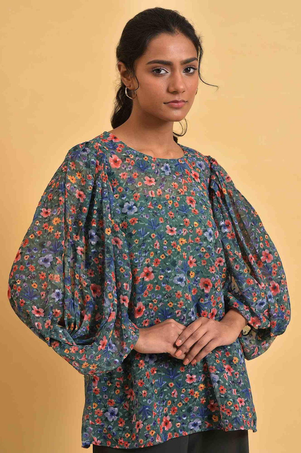 W for Woman Green Floral Printed Georgette Top with Puffy Sleeves | Grocsy