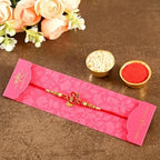 Auspicious Om Pearl Rakhi & Kaju Roll Box | Grocsy