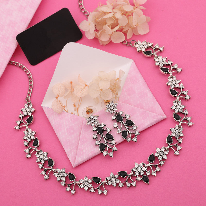 Tehzeeb Creations Silver Pleated White Diamond With Baby Black Beads Necklace Set | Grocsy
