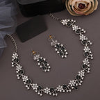 Tehzeeb Creations Silver Pleated White Diamond With Baby Black Beads Necklace Set | Grocsy