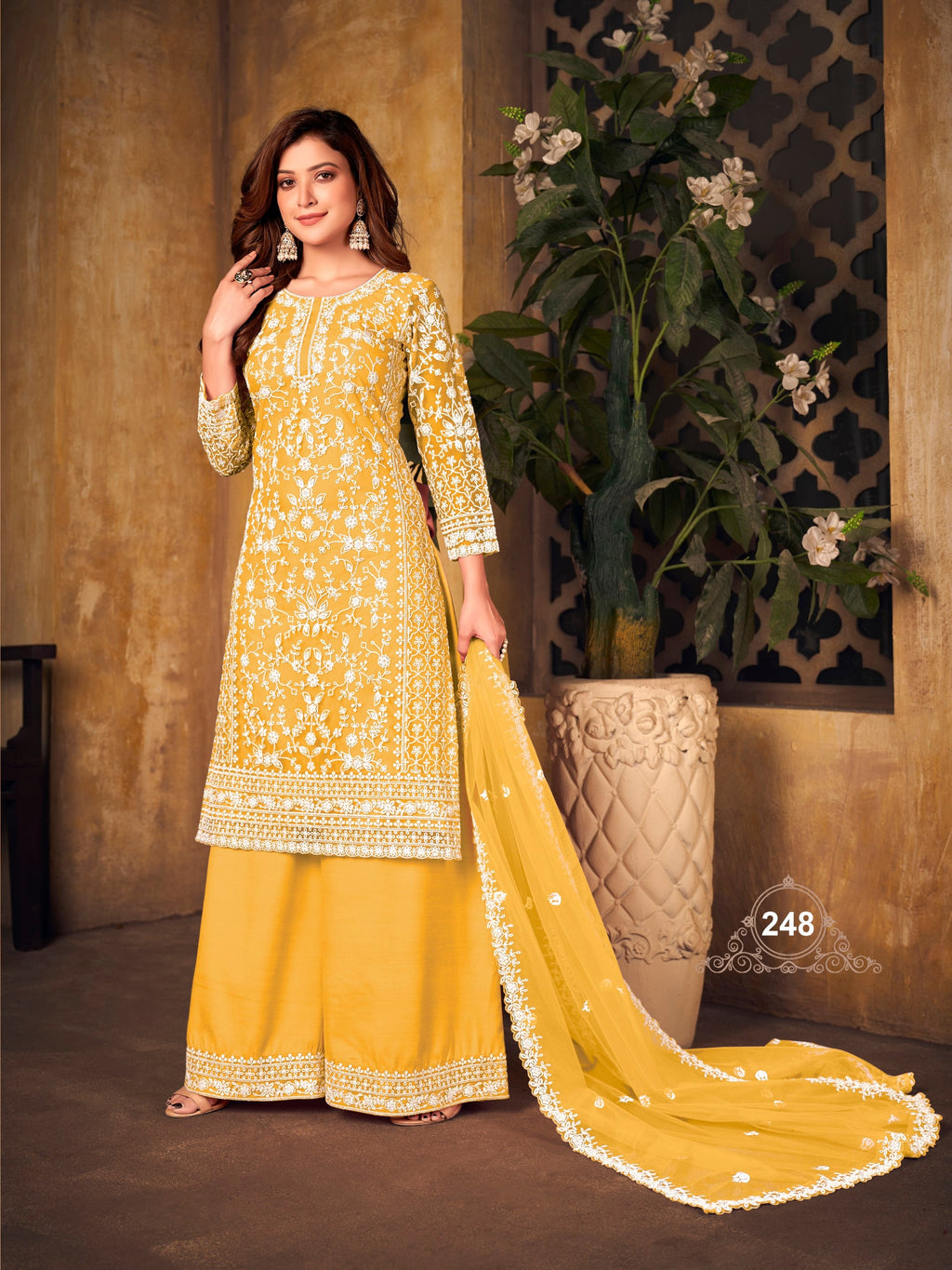 Anaita Yellow Embroidered Net Plazzo Suit | Grocsy