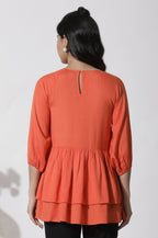 W for Woman Orange Embroidered Peplum Top | Grocsy