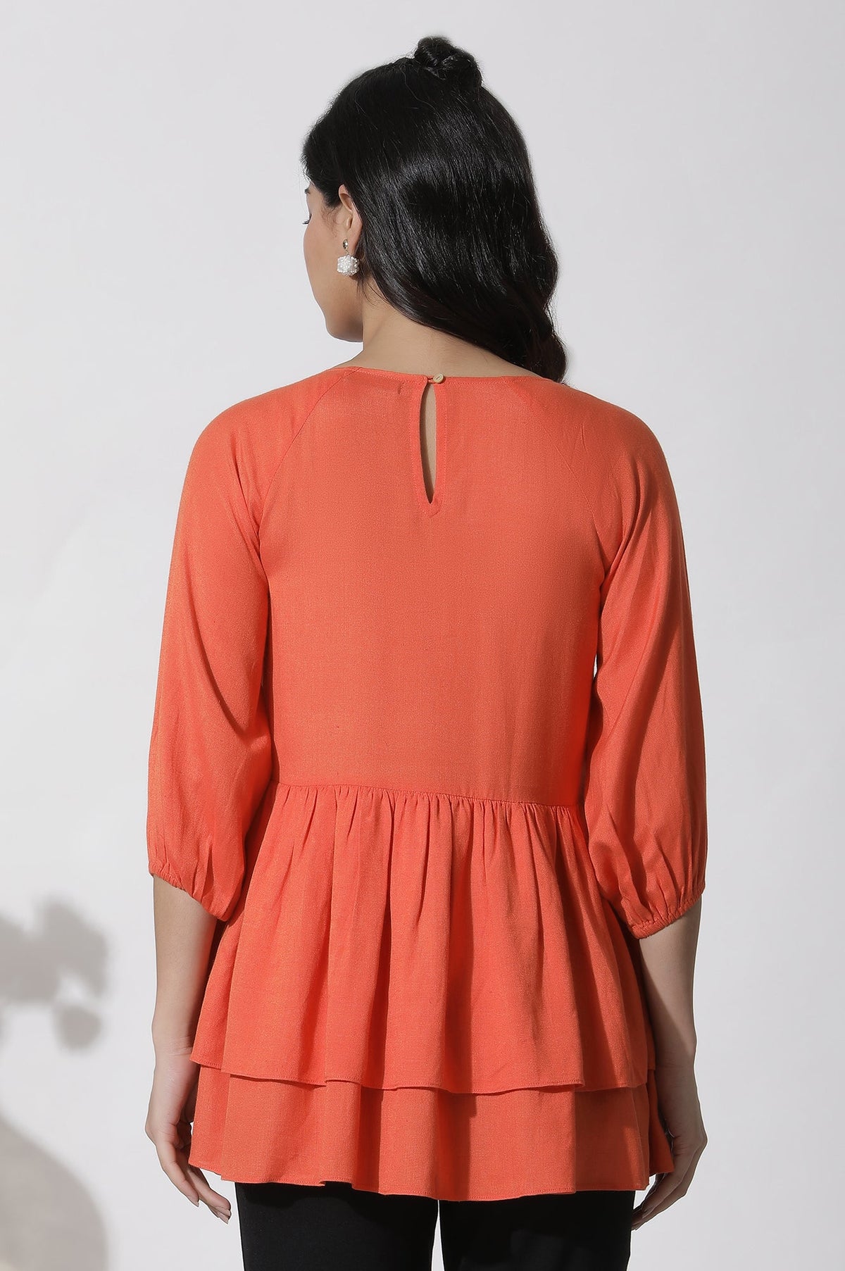 W for Woman Orange Embroidered Peplum Top | Grocsy