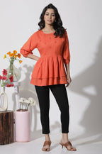 W for Woman Orange Embroidered Peplum Top | Grocsy
