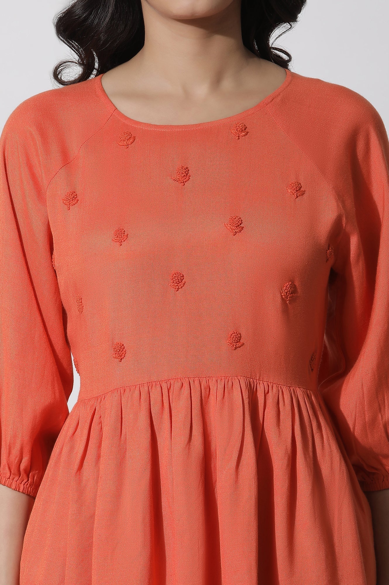W for Woman Orange Embroidered Peplum Top | Grocsy