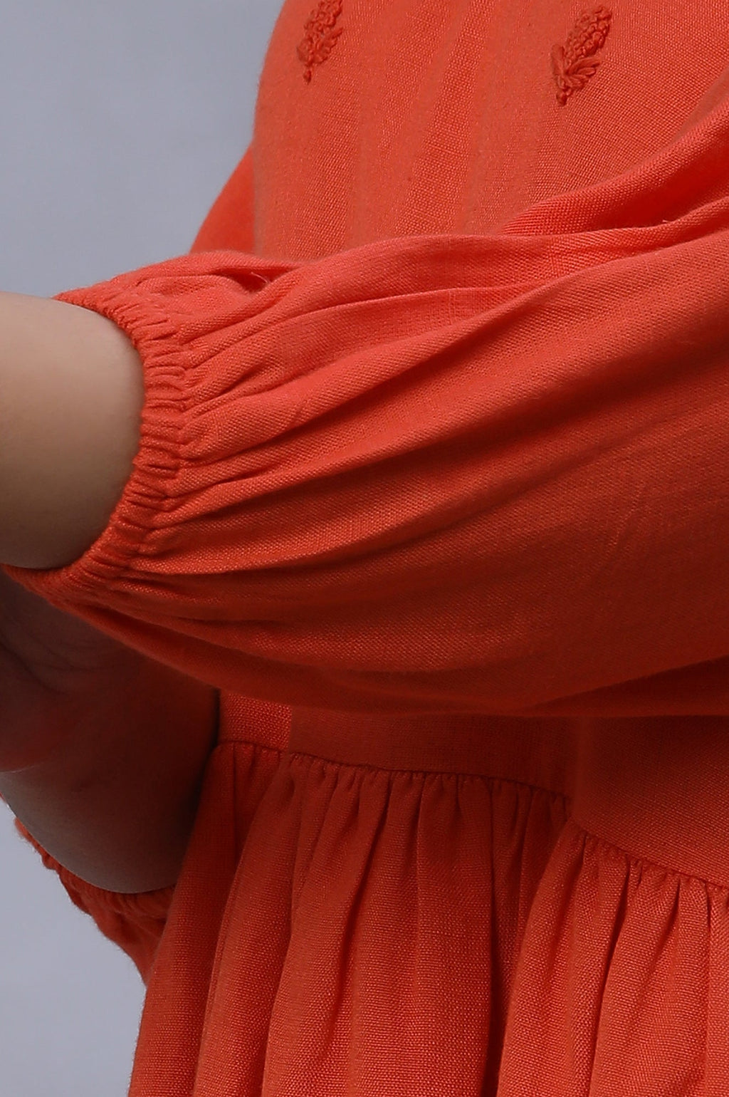 W for Woman Orange Embroidered Peplum Top | Grocsy