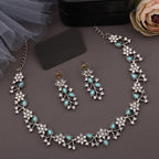 Tehzeeb Creations Silver Pleated White Diamond With Sky Blue Beads Necklace Set | Grocsy