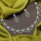 Tehzeeb Creations Silver Pleated White Diamond With Sky Blue Beads Necklace Set | Grocsy