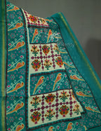 Vibrant Shades of Cream Patola Print Semi Chanderi Saree By Gayathri Reddy Designer Studio | Grocsy