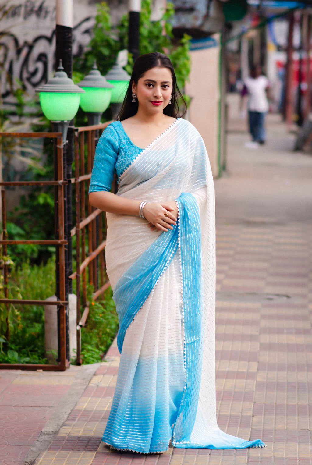 Blue Poly Chiffon Striped Saree with Unstitched Blouse - Hiral Fashion | Grocsy