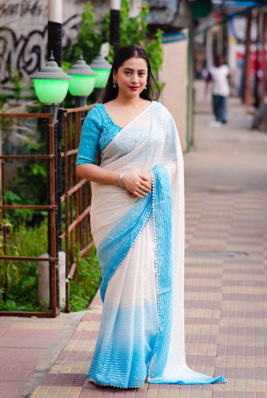 Blue Poly Chiffon Striped Saree with Unstitched Blouse - Hiral Fashion | Grocsy