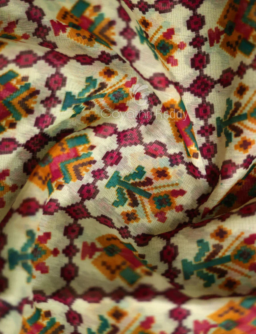 Vibrant Shades of Cream Patola Print Semi Chanderi Saree By Gayathri Reddy Designer Studio | Grocsy