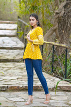 Juniper Women's Mustard Geometric Printed Rayon Flex Peplum Tunic | Grocsy