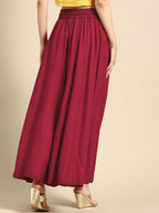 TAG 7 Women Black & Maroon Solid Flared Palazzos | Grocsy