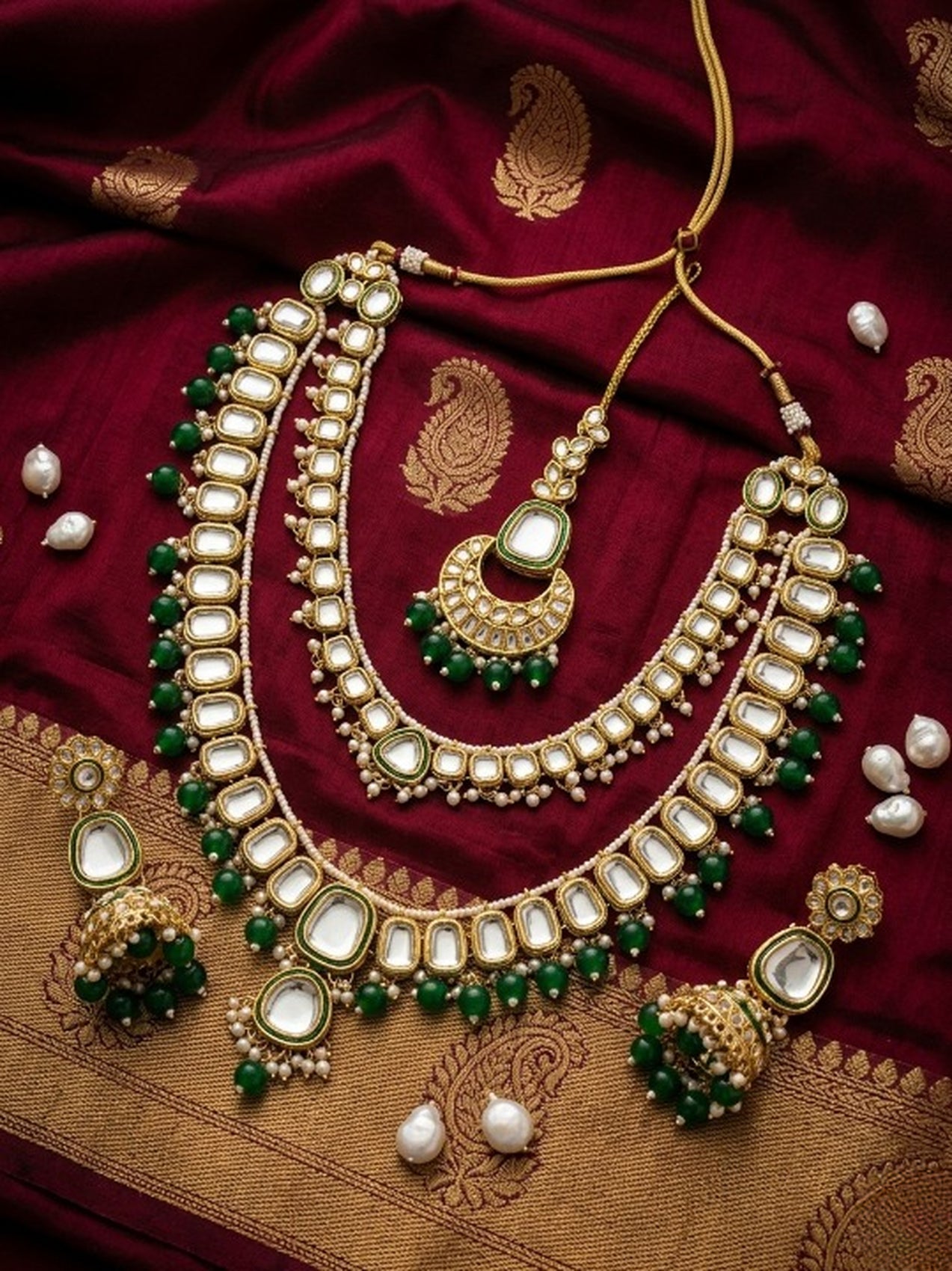 Jewel City Grand Kundan & Emerald Green Bead Necklace Set with Jhumka Earrings & Maang Tikka | Grocsy